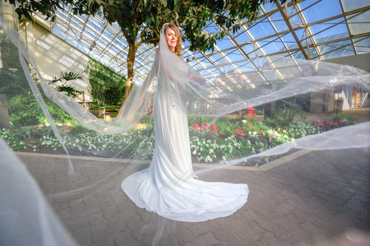 Bride with veil at Foellinger-Friemann Botanical Conservatory