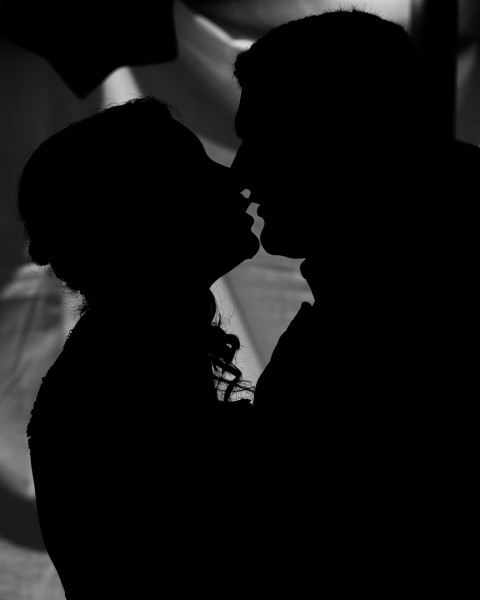 Wedding first kiss silhouette