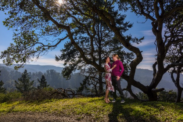 Engagement photo of couple -  Mountain top love